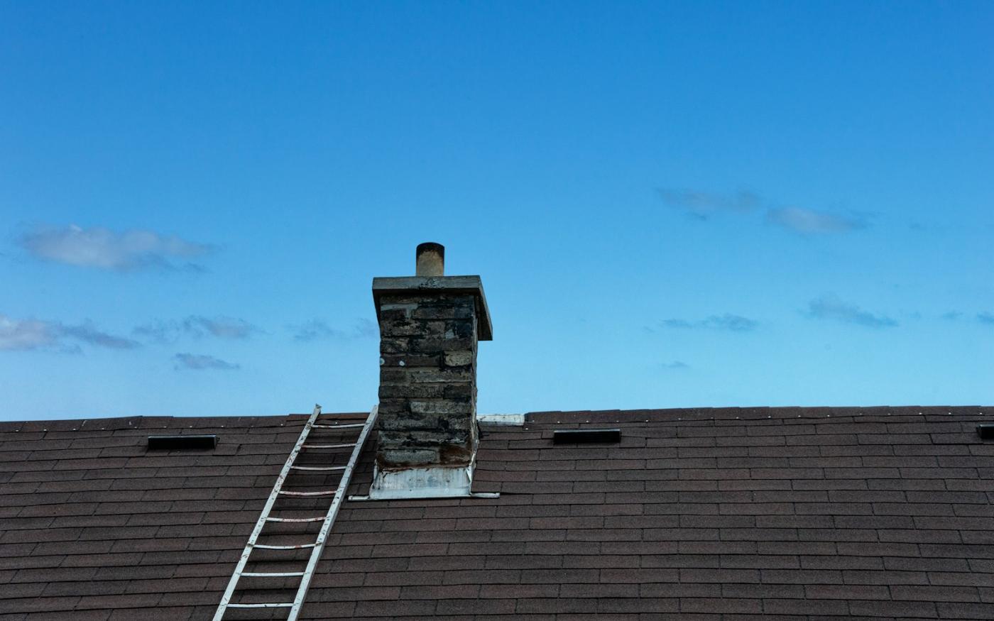 Chimneys are one of the most common leak points on a shingle roof - the flashing where brick meets shingle has to be sealed and stepped correctly.