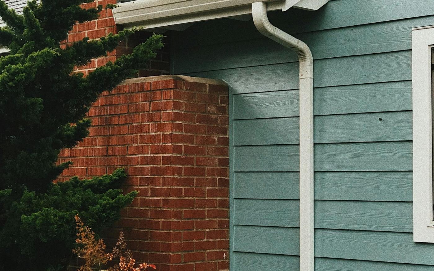 Gutters and downspouts carry water away from the fascia and foundation - sized and pitched right, they protect the whole house.